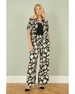 Yumi' Cotton Splash Print Relaxed Fit Trousers - Black
