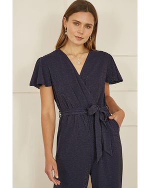 Yumi' Sparkle Stretch Wrap Jumpsuit - Blue