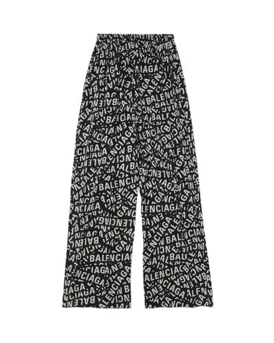 Balenciaga Pantaloni stile pigiama logo strips - Grigio