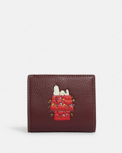 COACH X Peanuts Portemonnaie mit Druckknopf und Snoopy-Lichter-Motiv - Rot