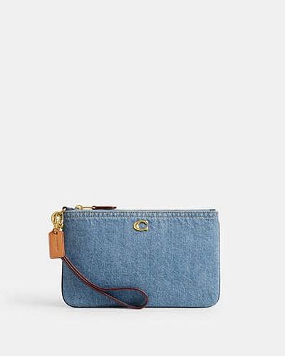 COACH Bolso pouch pequeño - Azul