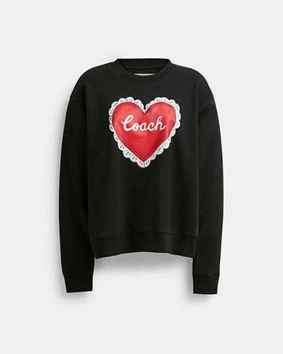 COACH Jersey de cuello redondo con corazón - Negro