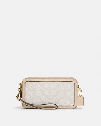 COACH Bolso cruzado Kira en jacquard de firma - Neutro