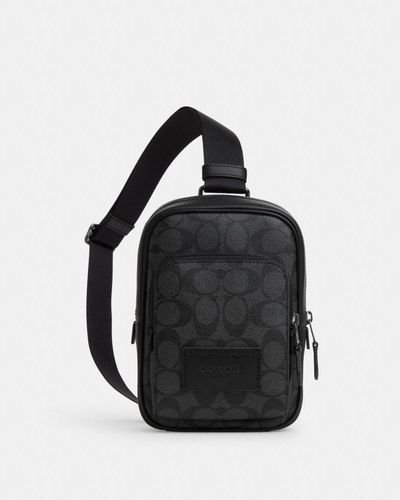 COACH Sacoche Track 14 en toile exclusive - Noir