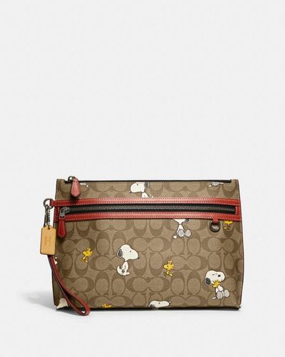 COACH : Pochette cabas X Peanuts en toile exclusive avec imprimé Snoopy Woodstock - Multicolore