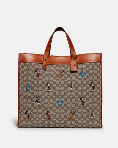 COACH Disney X Field Tote 40 In Signature Textile Jacquard With Mickey Mouse And Friends Embroidery - Brown