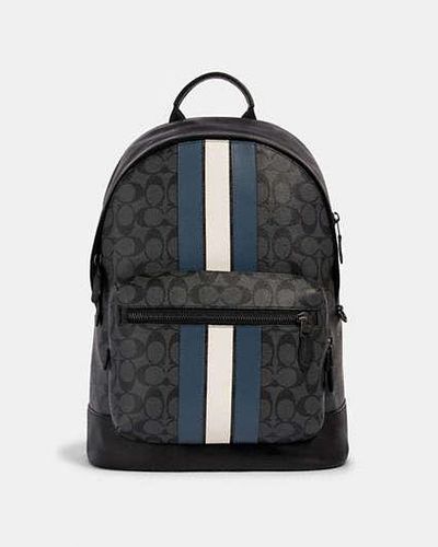 laptop sleeve in signature canvas with coach varsity