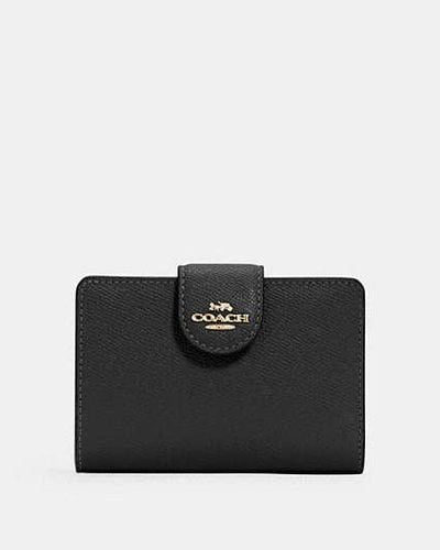 COACH Cartera mediana con cremallera Corner - Negro