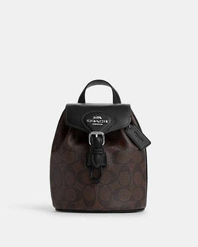 COACH Mochila convertible Amelia de lona de firma - Negro