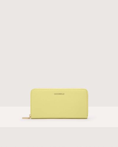 Coccinelle Große Brieftasche aus genarbtem Leder mit umlaufendem Reißverschluss Metallic Soft - Gelb