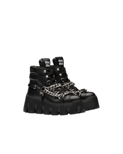 Miu Miu Leather Booties - Black