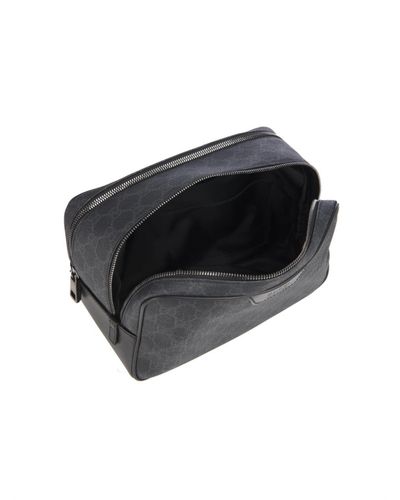 black gucci toiletry bolsa