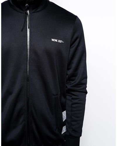 black tracksuit top