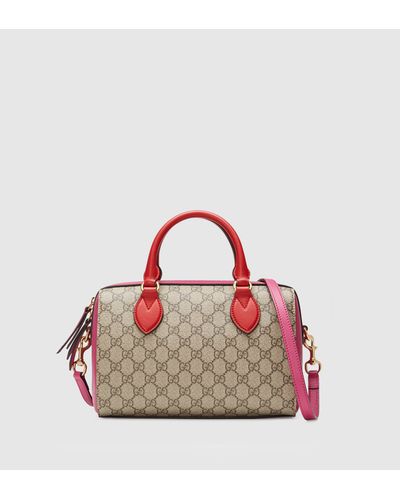 gucci supreme top handle bolsa