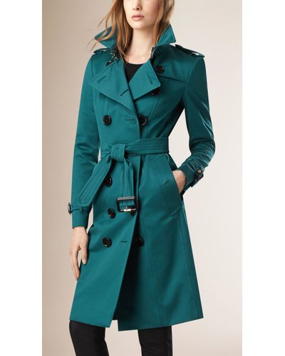 teal trench coat