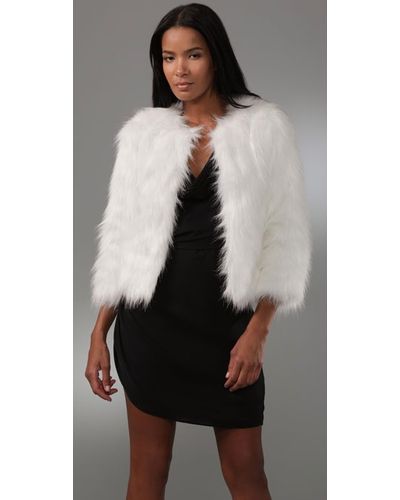 white faux coat