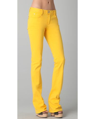 yellow bootcut jeans