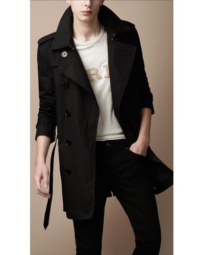 black mid length coat