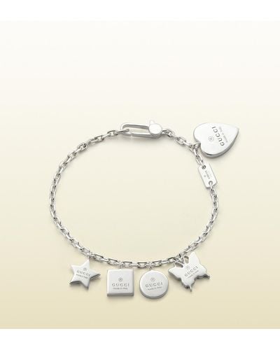 Gucci Bracelet with Gucci Trademark Engraved Charms in Silver (Metallic) |  Lyst