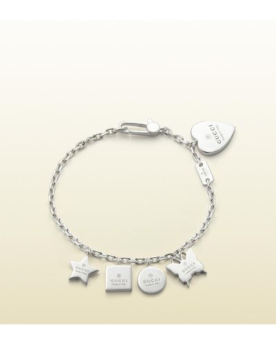 heart bracelet with gucci trademark