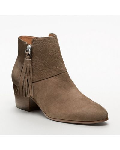 coach lorimer coated canvas monogram combat booties