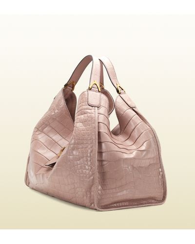 Soft stirrup light pink crocodile shoulder bag Clearance