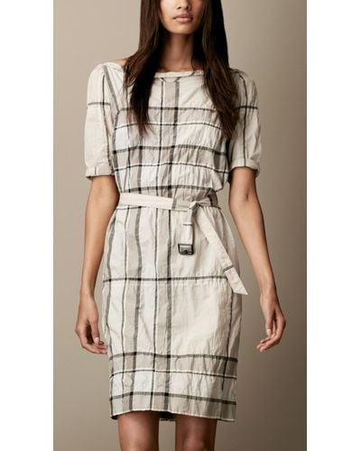 beige button up shirt