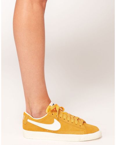 mustard yellow nike blazers