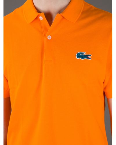 orange polo shirt lacoste