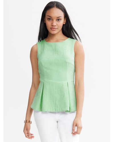 Banana Republic Textured Peplum Top in Green - Lyst