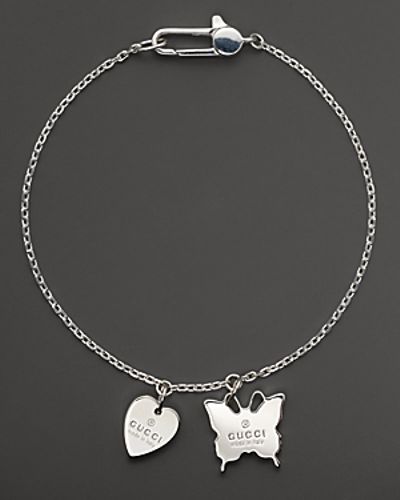 heart bracelet with gucci trademark