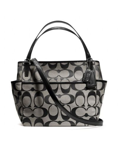black coach purse with silver c's