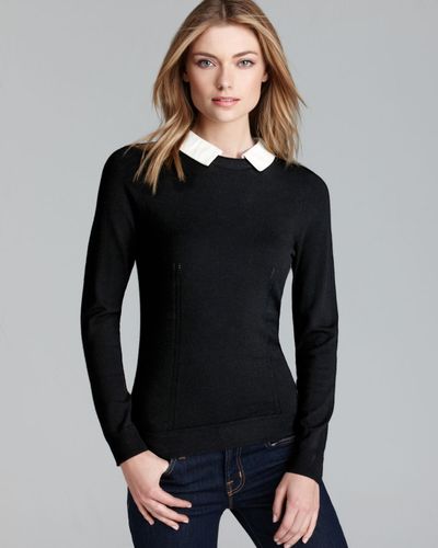 grey sweater with white collar