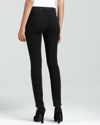 J Brand 811 Mid Rise Skinny Jeans In 