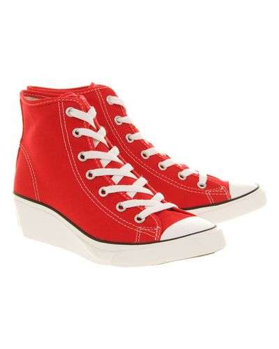 red heeled converse