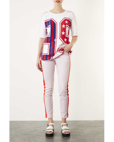 jeans with pink side stripe
