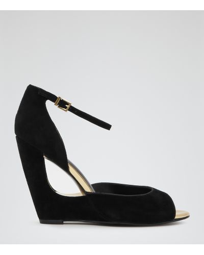 black cut out sandals