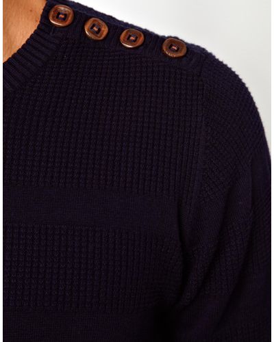 blue button sweater