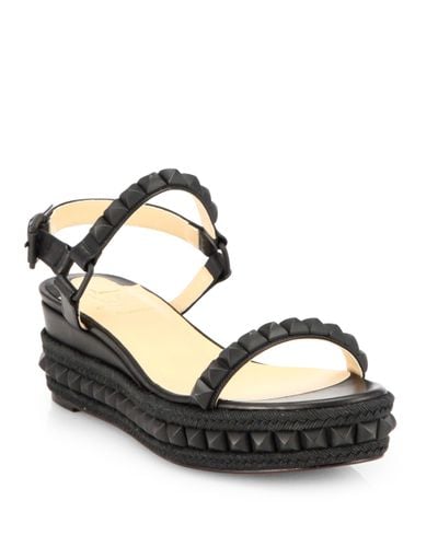 Christian Louboutin Cataclou Studded Wedge Sandals in Black - Lyst