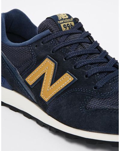 new balance blue gold