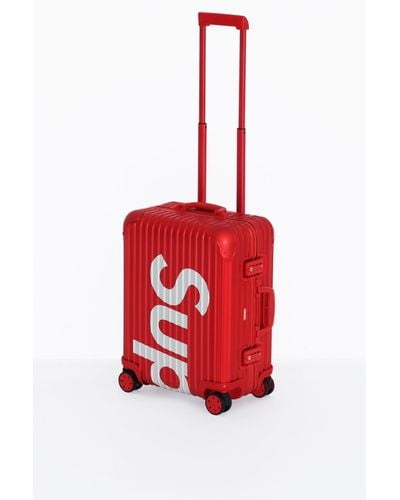 RIMOWA Supreme Topas Multiwheel 45l in Red | Lyst