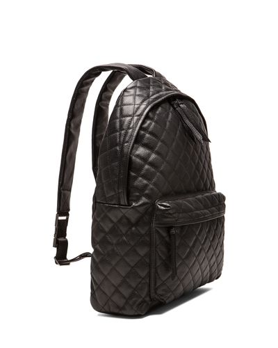 leather quilted backpack