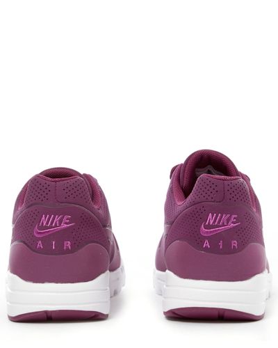 nike raspberry trainers