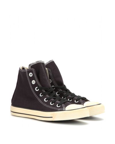 converse with zipper on back