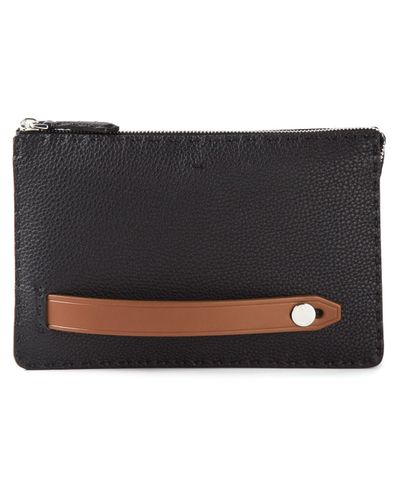 clutch with hand insert