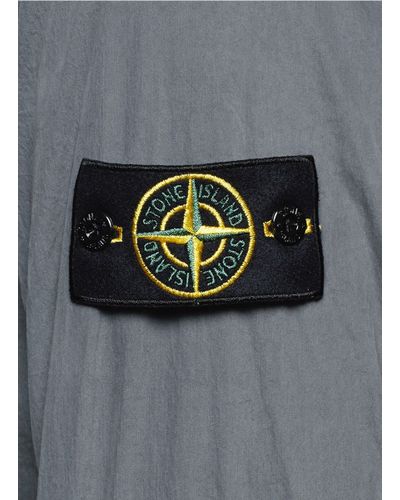 stone island jumper badge on front
