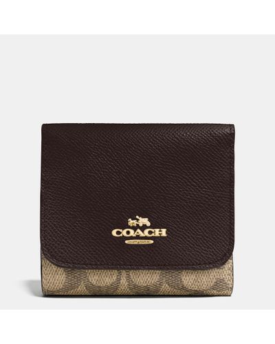 COACH Small Wallet In Colorblock Signature Coated Canvas in Light Gold ...