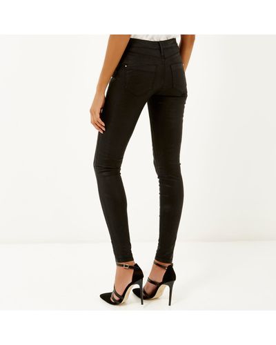 Black Coated Molly Jeggings | Lyst UK