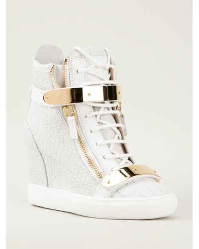 white wedge heel trainers