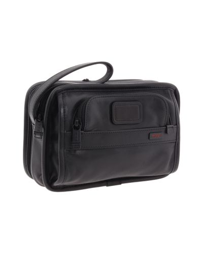 tumi business clutch